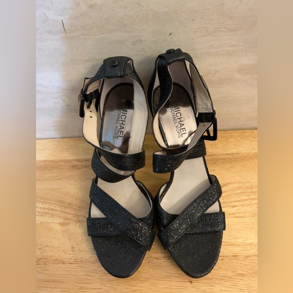 MICHAEL Michael Kors Evie platform sandals in black glitter.